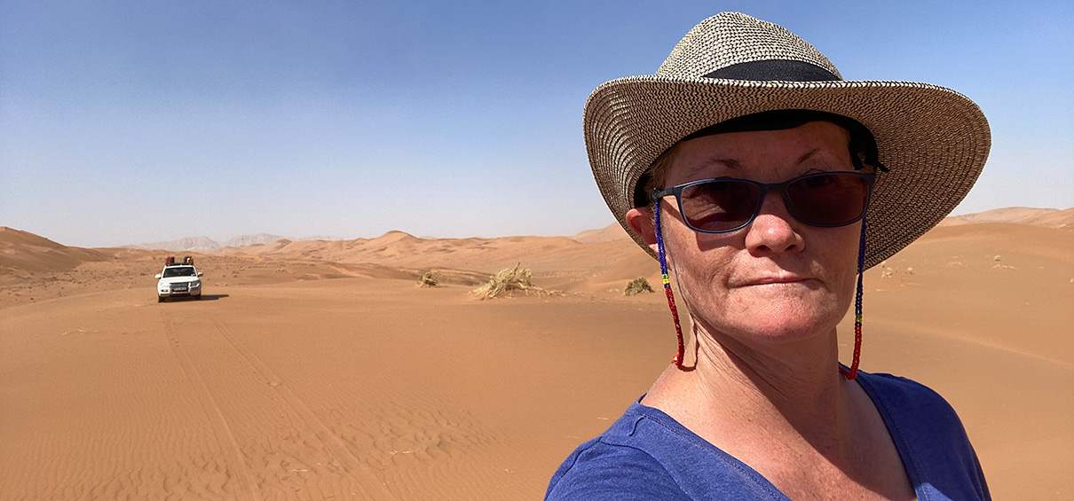 Margie Viljoen with her vehicle in the far background